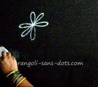 petals drawn around a point  making-basic-rangoli-2411d.jpg