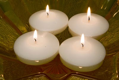 http://www.candlefactorystore.com/floating-round-candles/