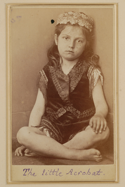 Photo:Reclining girl,1856-1880,Lewis Carroll,small girl,lying 