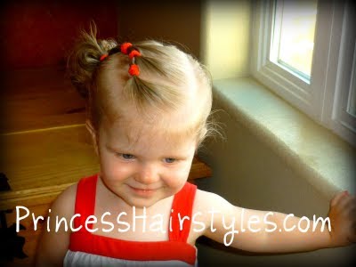 baby with pigtails We have found that elastic braid hairstyles are great for