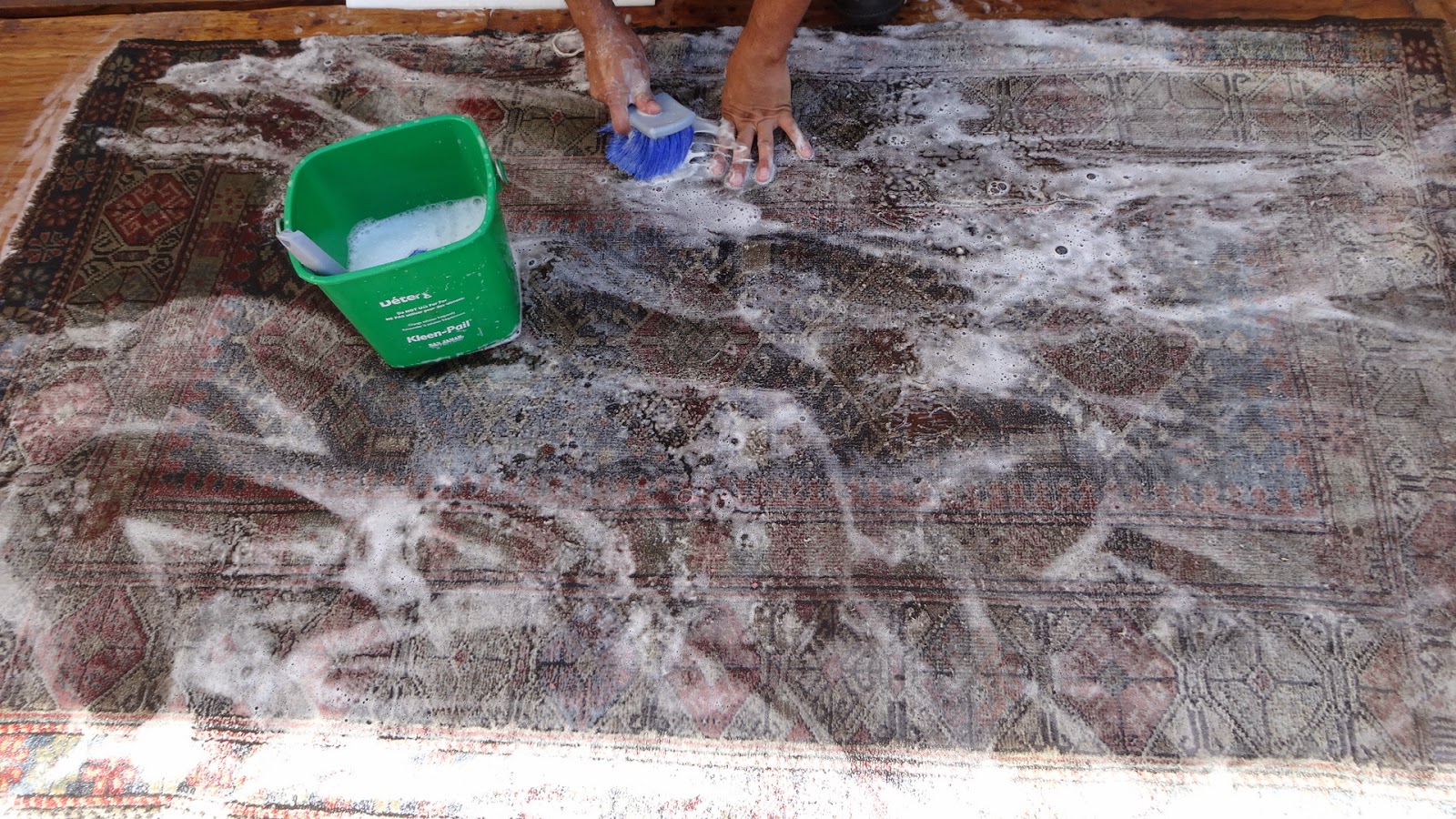 Rug Master Hand Washing Rugs at Rug Ideas, Los Angeles