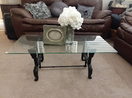 glass cast iron table $sold