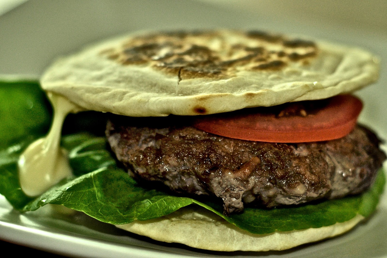 The Kitchen Journal Beef Burger with Flat bread stuffed with cheese