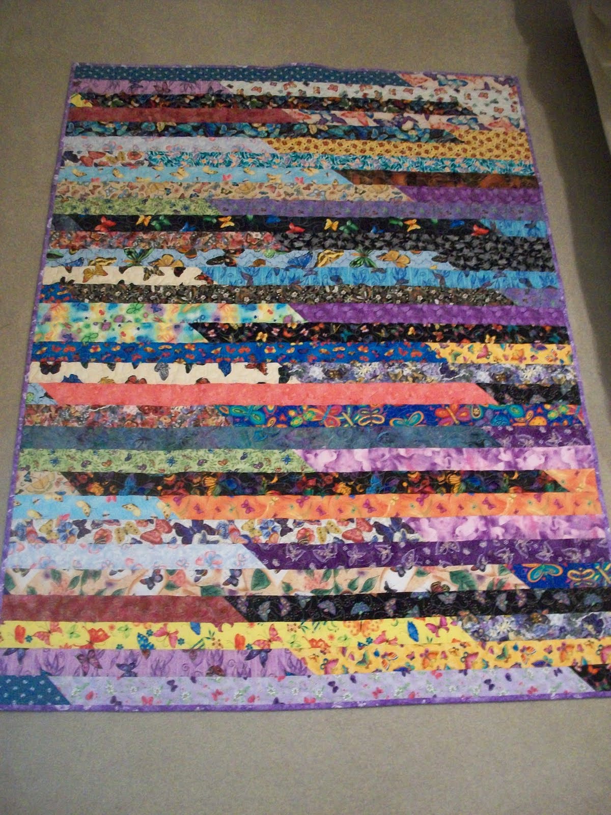 Debbie's Blog Jelly Roll Race Quilt Finished!