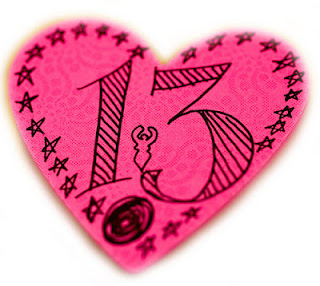 A heart shape with the number 13 written on it