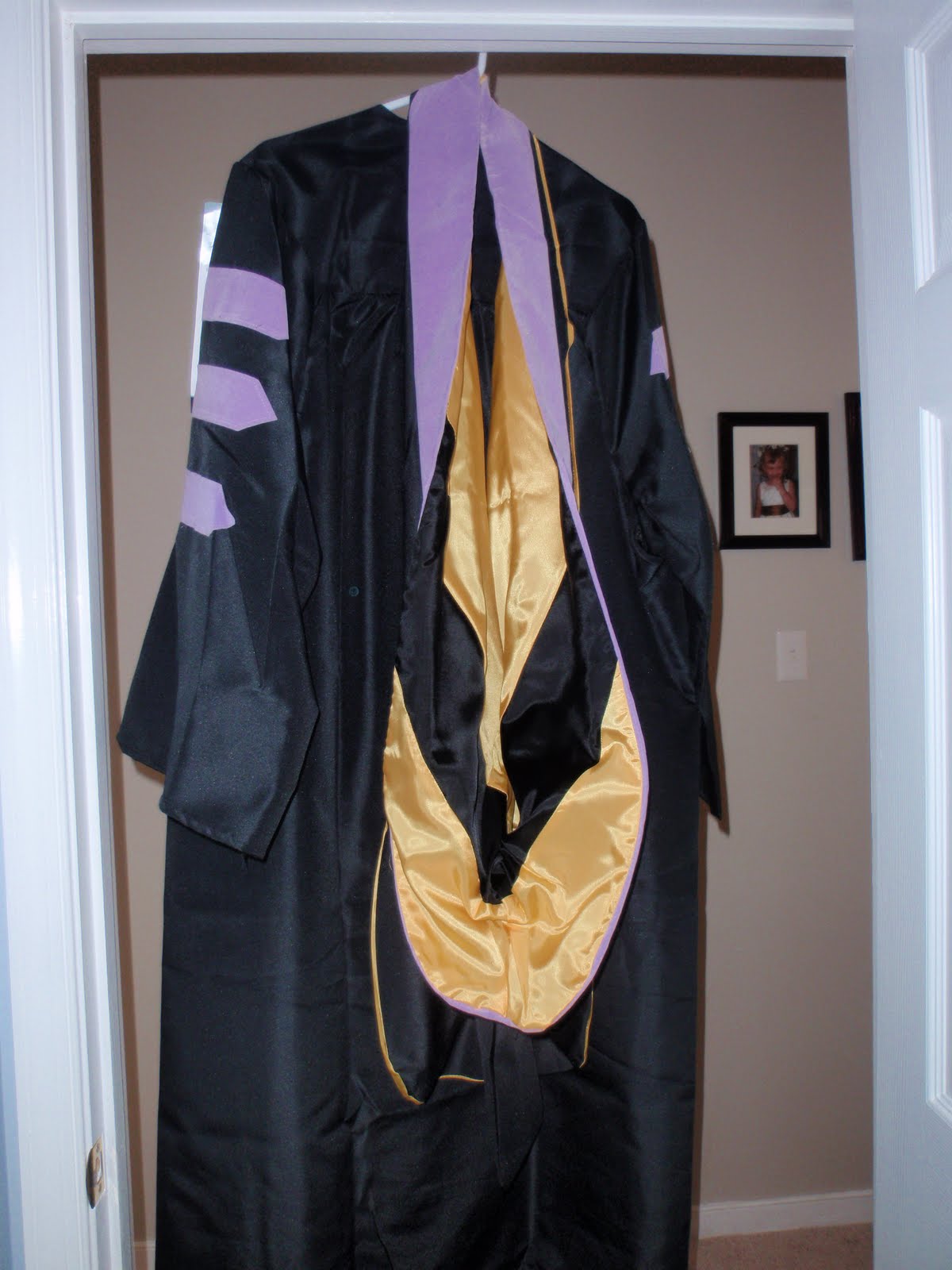 Three little Anardi's the official cap and gown