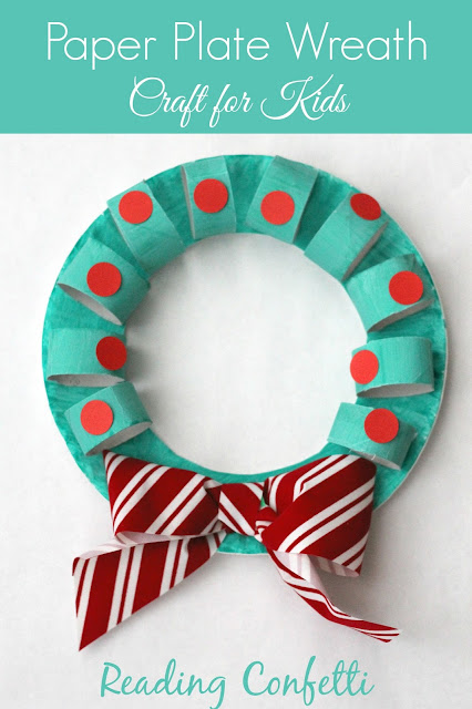 An easy Christmas wreath crafts for kids using cardboard tubes and paper plates