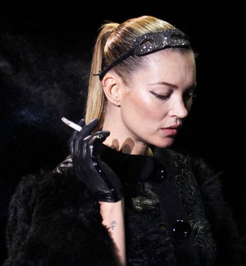 kate moss smoking catwalk. Kate Moss Lights Up LV Catwalk