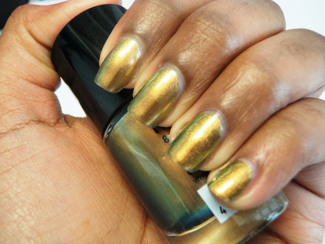 Review and swatches nail polish by Catrice Genius In The Bottle gold.