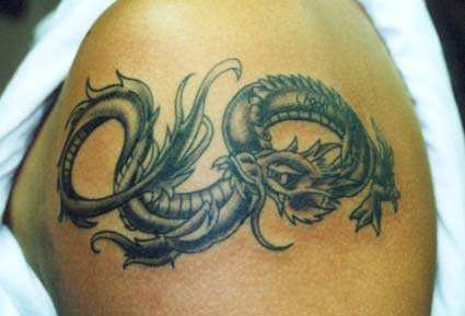 Arm Tattoos For Guys images dragon tattoo arm design Tattoo