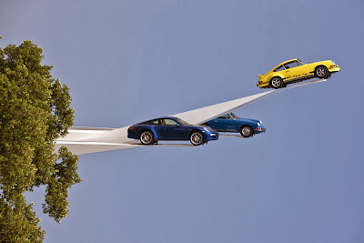 Artist and designer Gerry Judah continues his unique automobile sculptures with this special installation commissioned by Porsche‘s Great Britain subsidiary to mark the Porsche 911‘s 50th anniversary. The seemingly gravity-defying sculpture consists of three Porsches: a 1963 911, a 1973 911 Carrera RS 2.7, and a 2013 911. Each car rests at the end of a white steel arrow reaching up towards the sky. Weighing in at a hefty 22 tonnes, the sculpture is as much a feat of engineering as it is a work of art. The sculpture was recently on display at the Goodwood Festival of Speed in England.