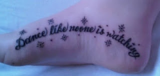 Failed tattoo - a girl with a misspelled tattoo on the foot