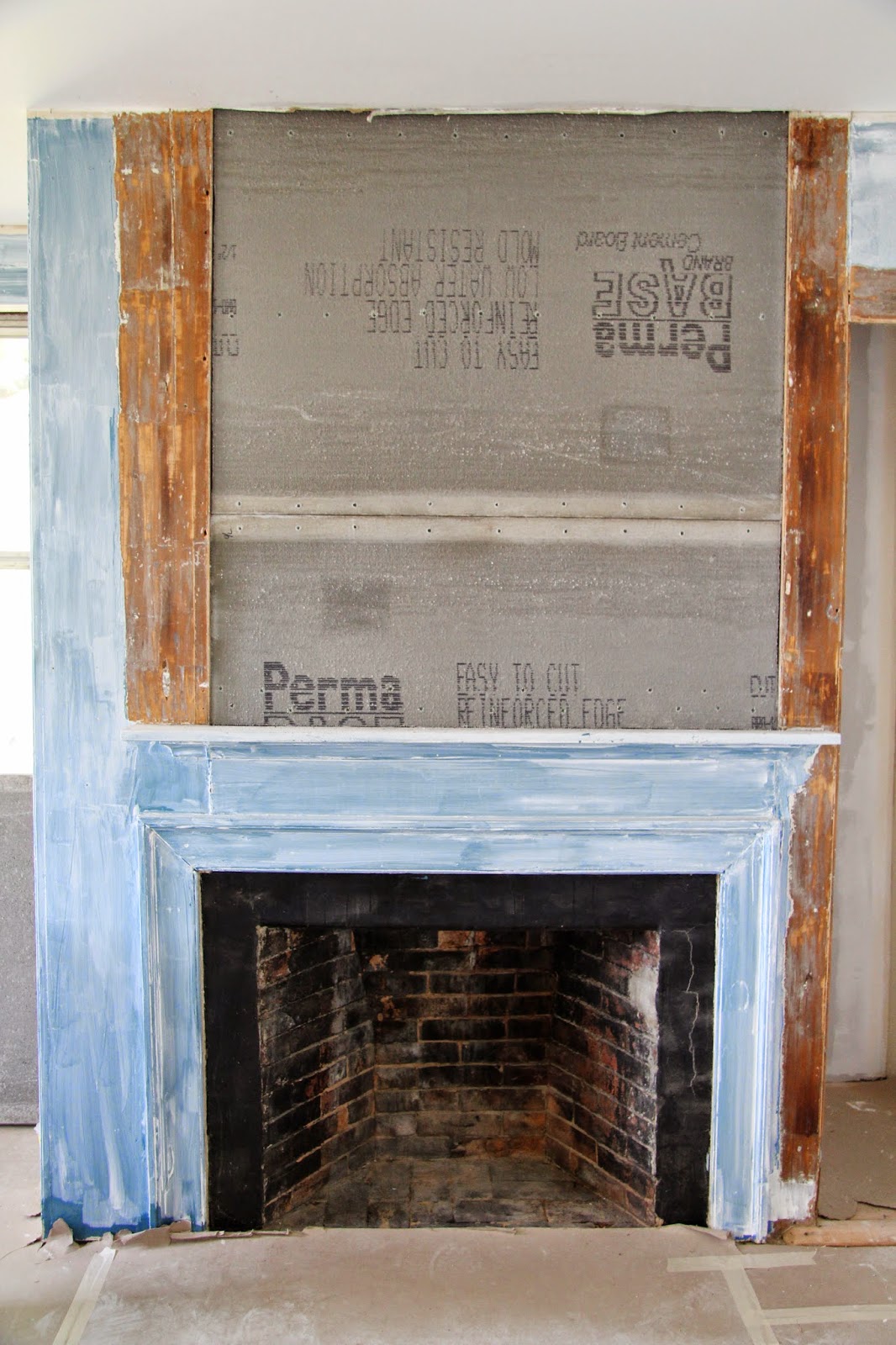 In the Fields Putting Back the Fireplace Panels