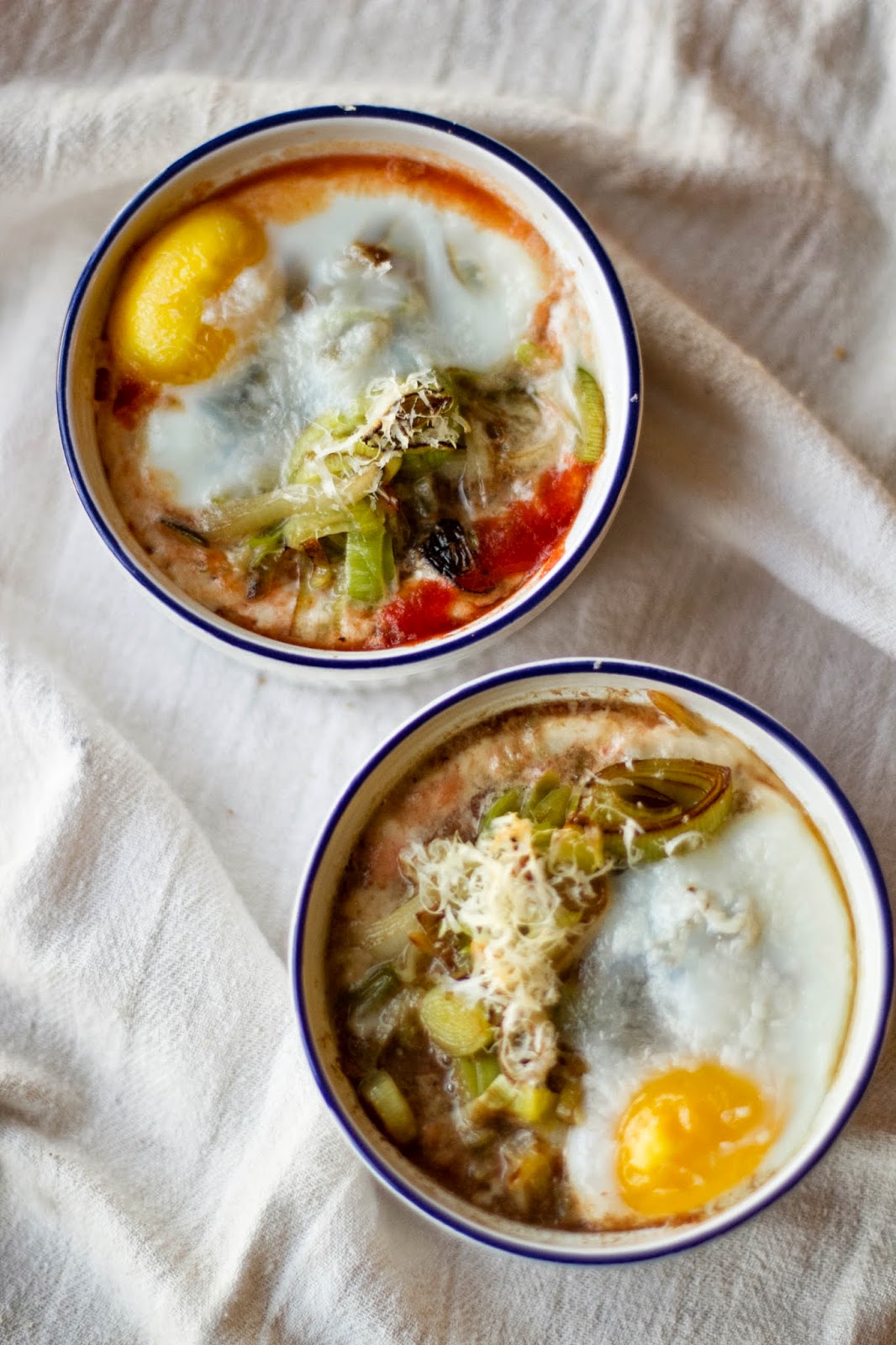 Buttered Up Baked Eggs in Stewed Tomatoes with Caramelized Leeks