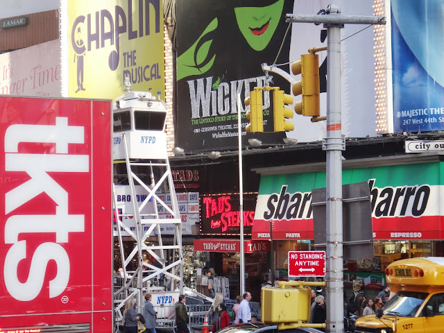 NYPD Surveillance Booth at the crowded area in Times Square in New York City, New York, USA NYPD Surveillance Booth at the crowded area in Times Square in New York City, New York, USA