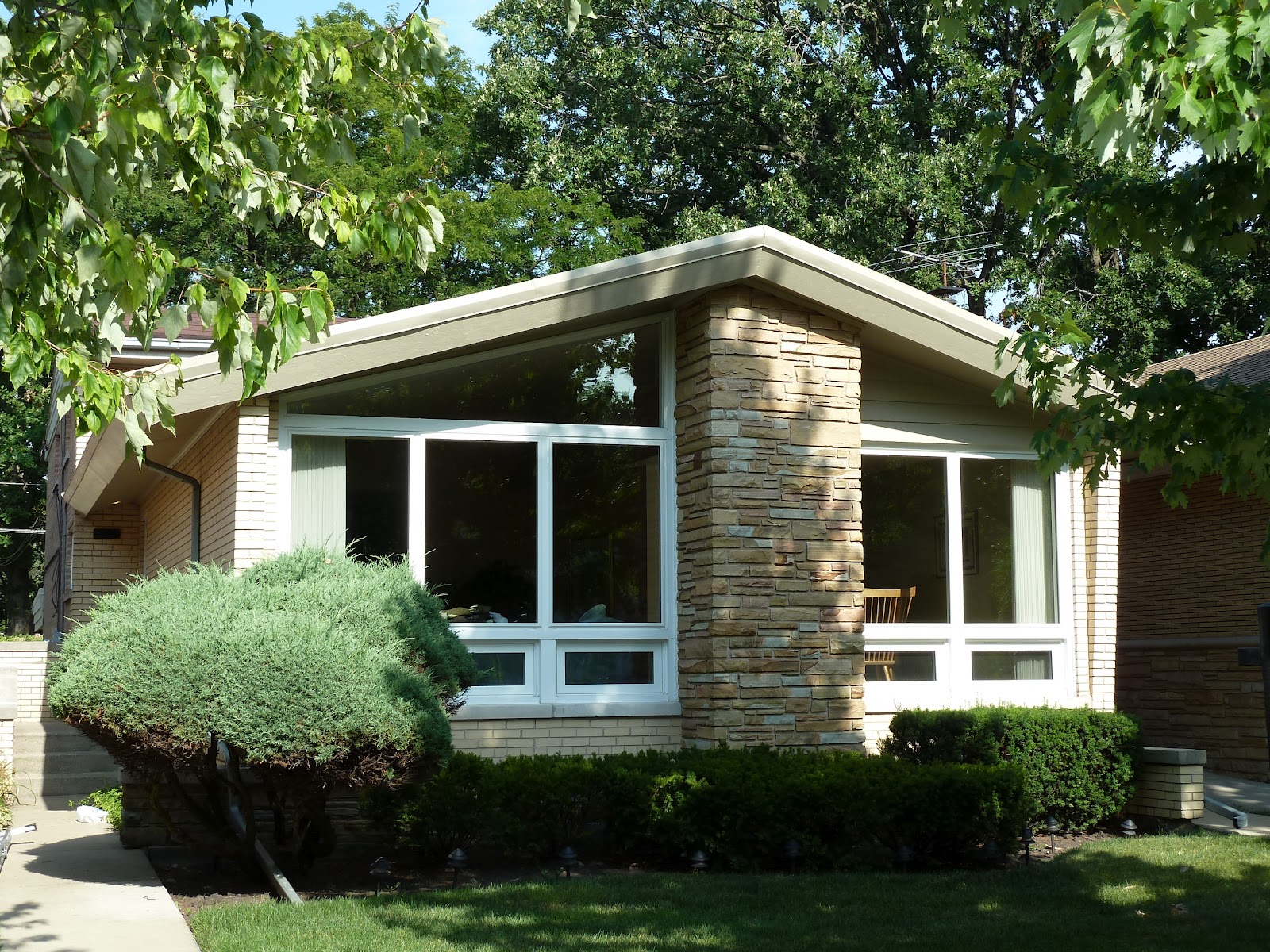 The Chicago Real Estate Local Under Contract Mid Century Modern house in Solomon School district