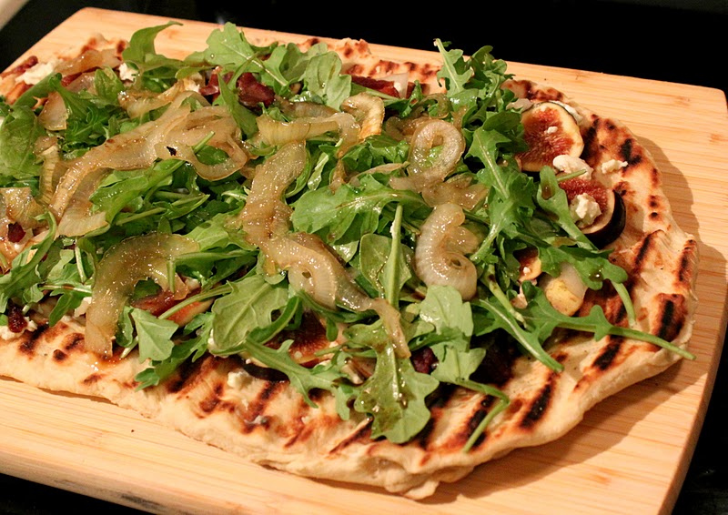 the swell quenelle fig, pear and arugula grilled goat cheese flatbread pizza