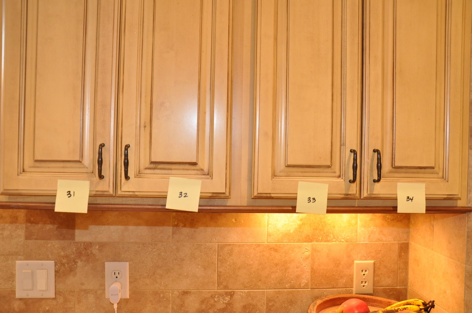 How To Put Up Kitchen Cabinets