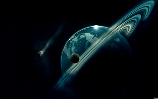 [Saturno ed i suoi satelliti naturali come la Luna]