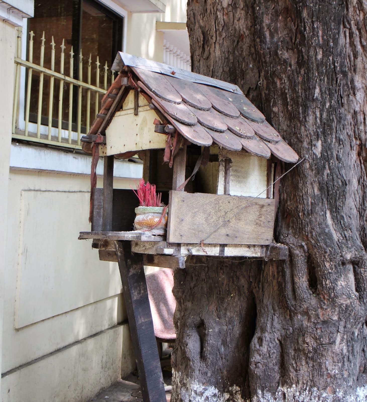 little shrine or spirit house, outside royal palace in Phnom Penh