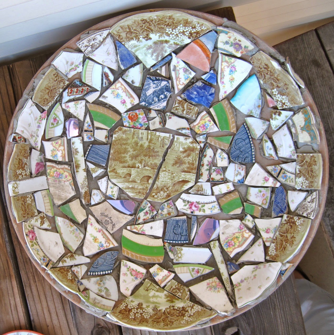 Here is my first broken plate mosaic ready for the Thinset to dry which