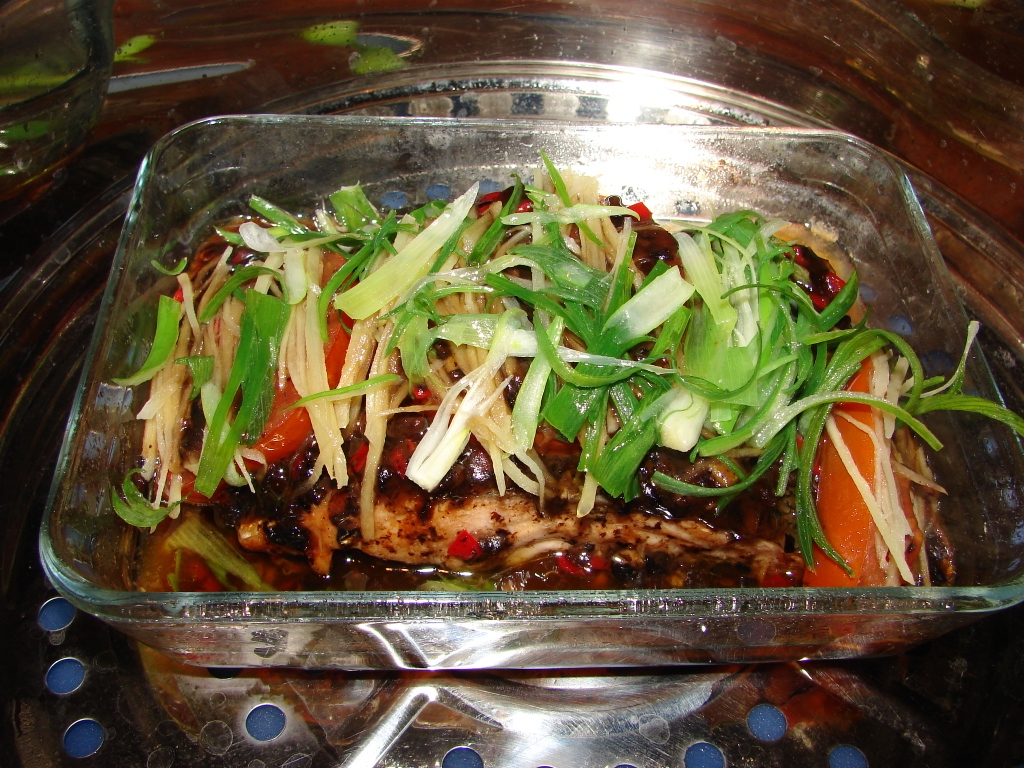 Steamed fish with black bean sauce and tomato