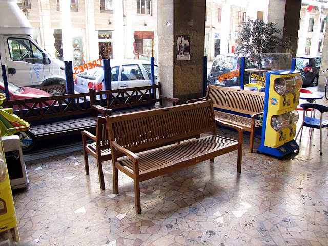 Benches under the porticoes of Via Grande, Livorno