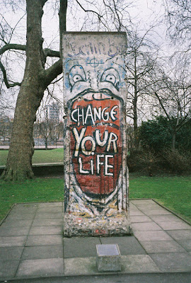 Berlin Wall Artwork and Graffiti and Political Cartoon Today