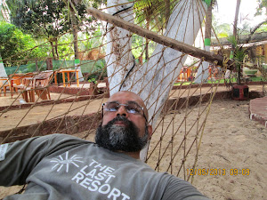 Relaxing on a hammock at "Darya Sagar Resort".