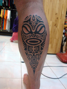 Leg tattoo Tiki face tahiti marquesas style mix