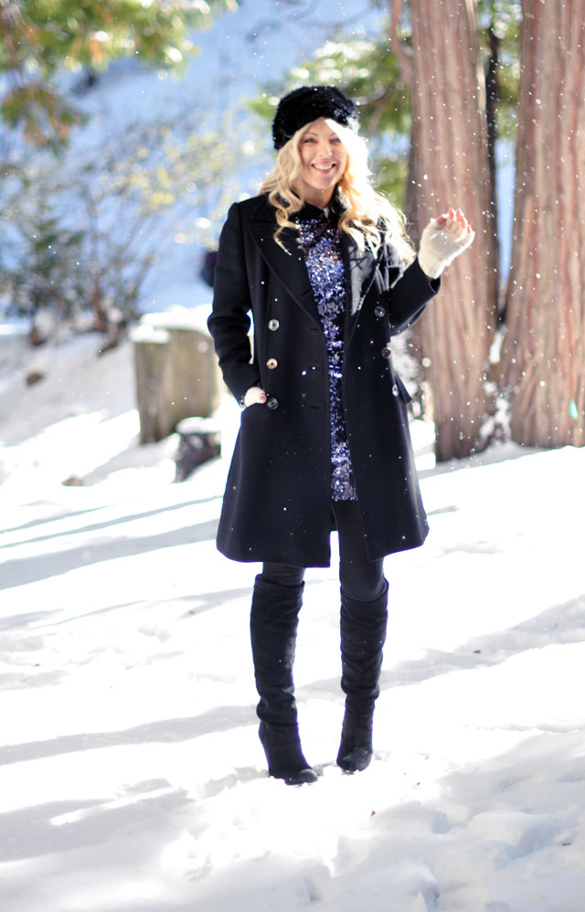 blue sequined mini party dress with boots and a coat