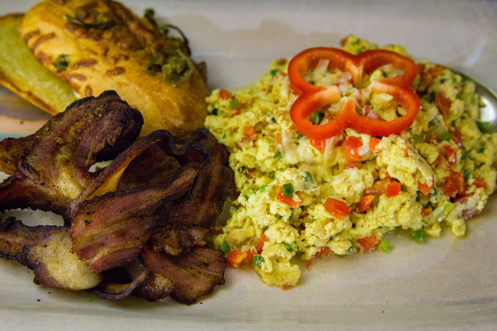 Tom and Anita : Cheese Scrambled Eggs with Bacon and Jalapeno-Cheddar
