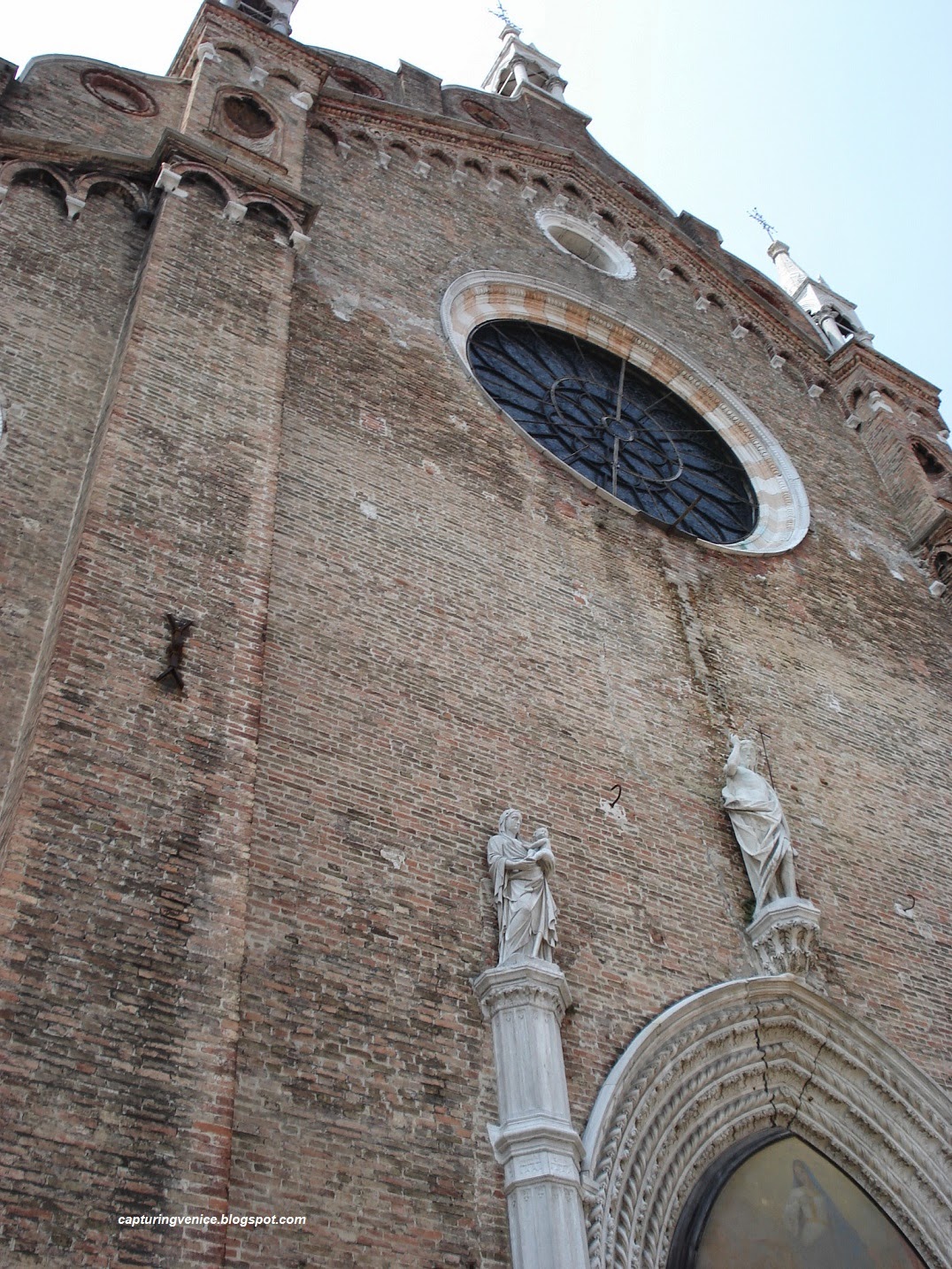 Entry to the Frari church, Venice capturingvenice.blogspot.com
