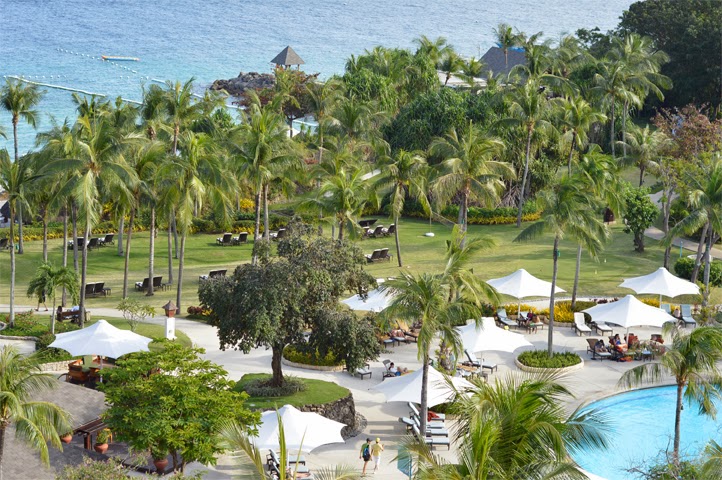 White beach resort with pool