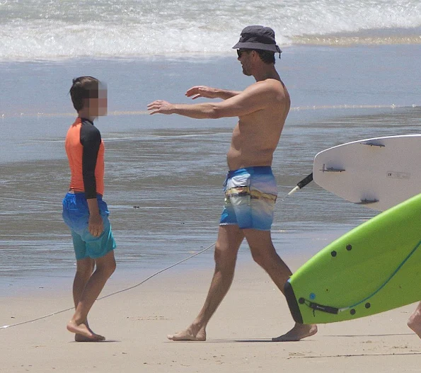 Crown Princess Mary was pictured in the surf with her husband Crown Prince Frederik and their children Prince Christian, Princess Isabella and Princess Josephine.