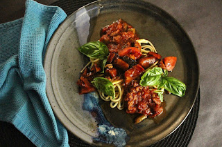 Spaghetti with Sausage Ragu and Fresh Tomato Balsamic Glaze