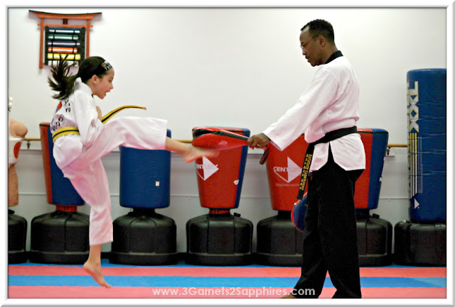 Jumping front kick in Logo Loops Taekwondo headband #loveourloops (sponsored)  |  www.3Garnets2Sapphires.com