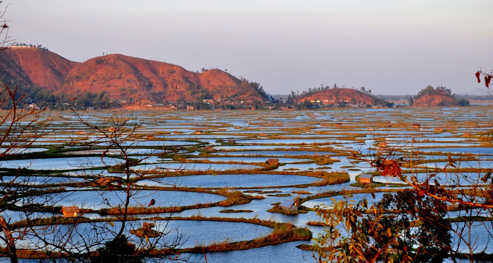 Amazing Places in The World to Visit Loktak Lake, Floating Islands of