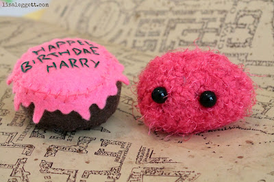 Harry's cake & Arnold the Pygmy Puff by Nixiebum on Flickr