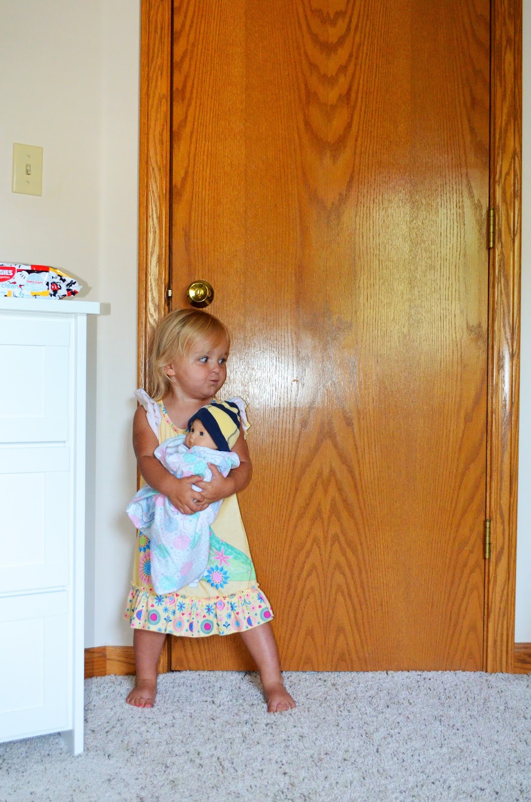 bitty baby string on neck