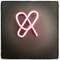 heart-shaped pink paperclip