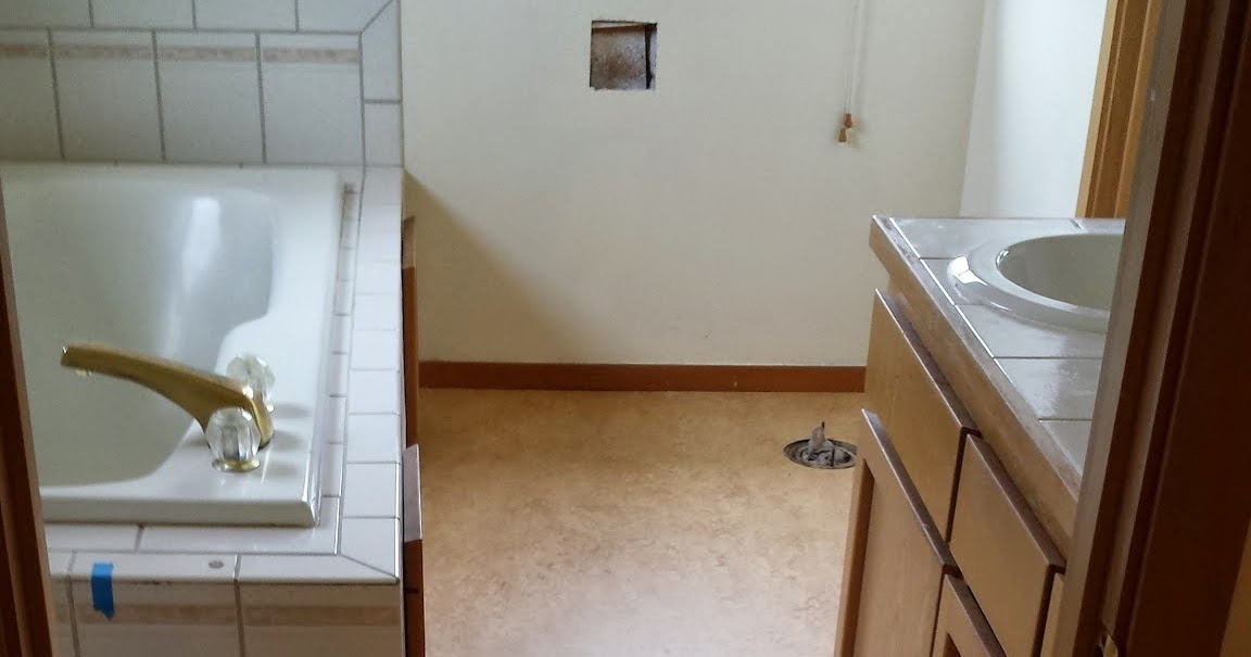 One Step Further Bathroom Installed with Marmoleum Dual Tile, Rust 2767