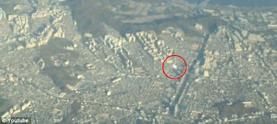 UFO Sighting Filmed From Airplane