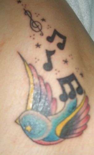 musical notes tattoo. musical note tattoos.