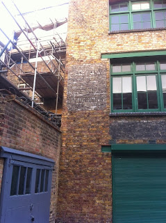 Ghost sign, Brownlow Mews, London