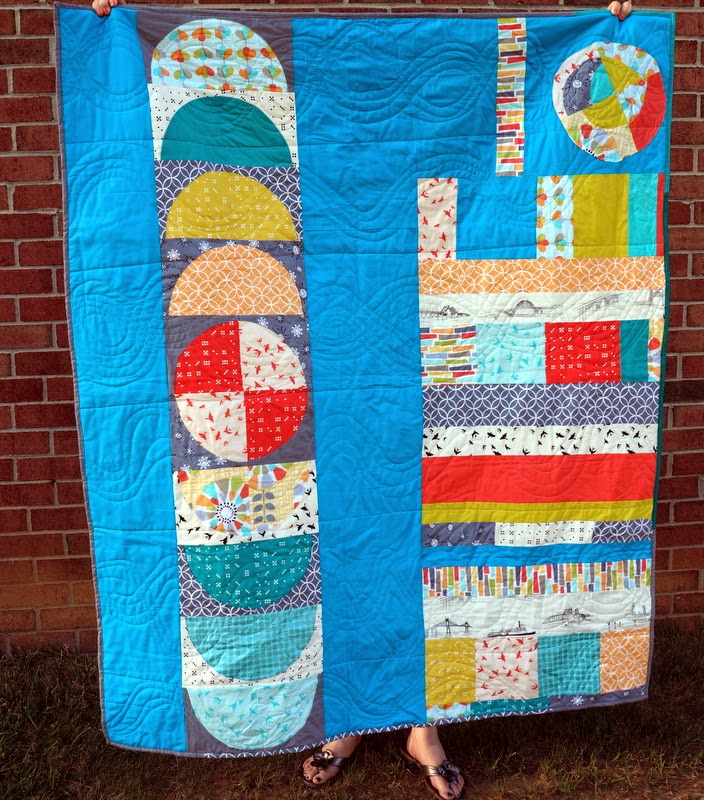 http://quiltyhabit.blogspot.com/2014/06/by-sea-finished-michael-miller.html