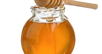 Le masque pour les cheveux de 2 oeufs et 1 cuillère à soupe du miel
