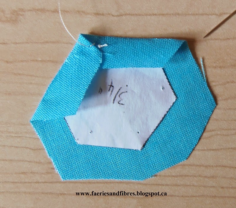 Faeries and Fibres Basting hexagons from the back and removing papers