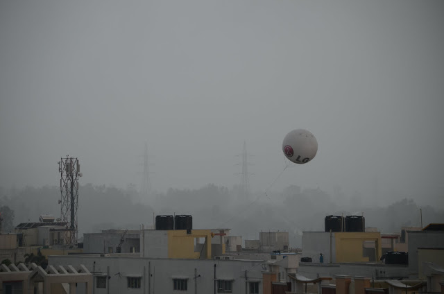 ad balloon in monsoon rains