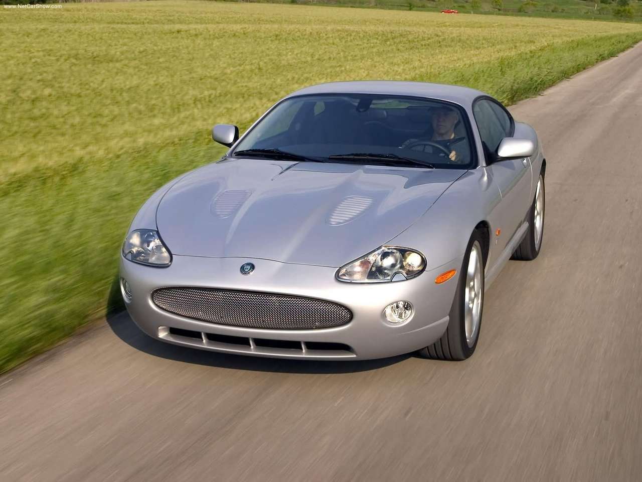 http://2.bp.blogspot.com/-J_6RTDSkThY/TZMgS1fFy1I/AAAAAAAACLc/gBFcoobh-qI/s1600/Jaguar-XKR_Coupe_2005_1280x960_wallpaper_04.jpg